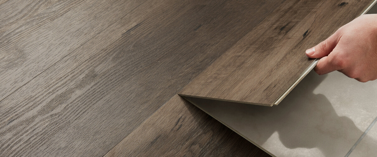 brown wooden flooring being slatted in